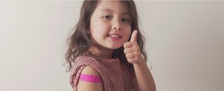 What are the vaccination requirements for my child's Dependent Pass in Singapore?