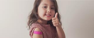 What are the vaccination requirements for my child's Dependent Pass in Singapore?
