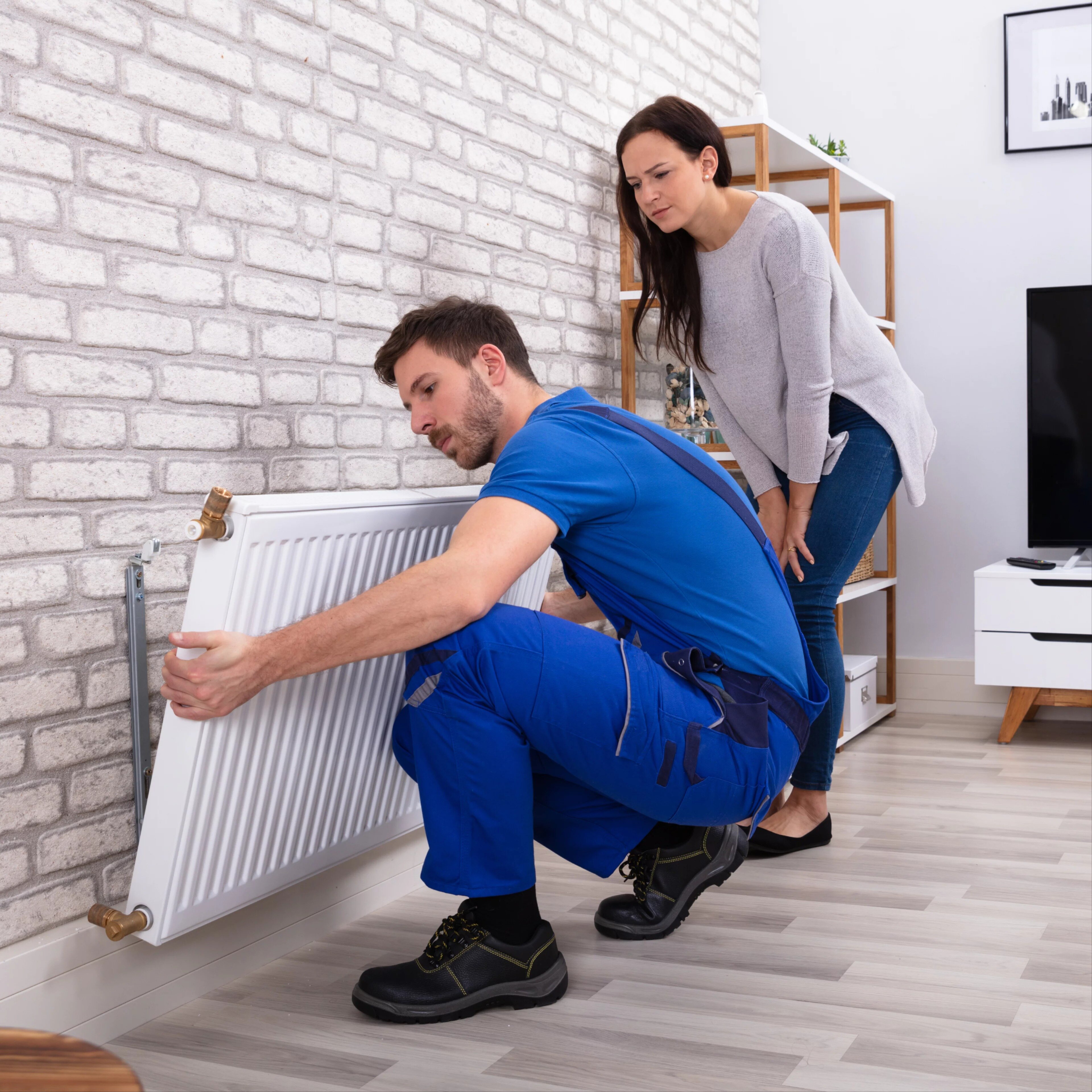 Installation d'un radiateur dans une maison